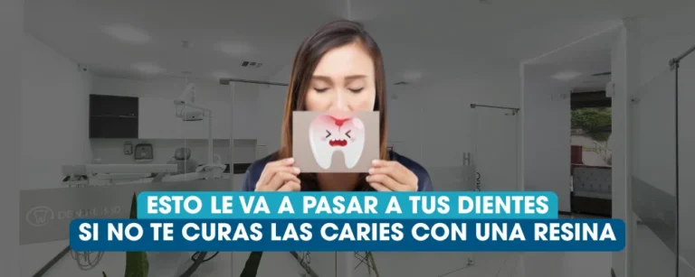 Mujer sosteniendo una ilustración de diente molesto para explicar qué pasa si no se trata una caries con resina dental
